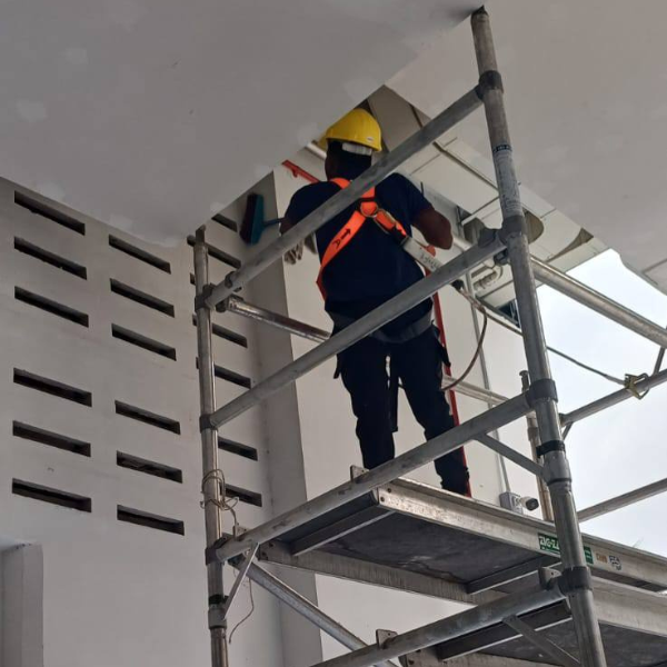 cleaning with ladder